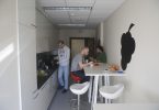 A worker relaxes during a short wellbeing break away from a desk in the office.