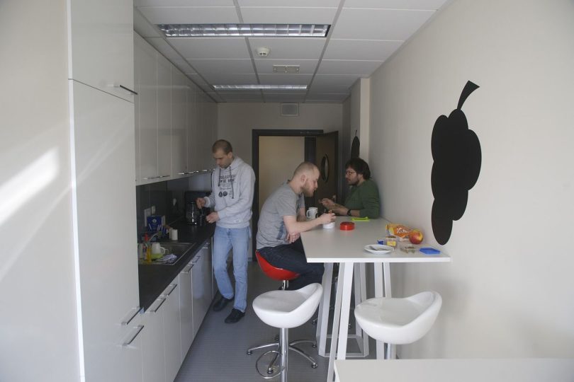 A worker relaxes during a short wellbeing break away from a desk in the office.